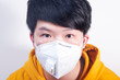 © Steve - A man wearing a N95 medical protective mask