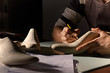 Italian shoes designer artisan, closeup on hands