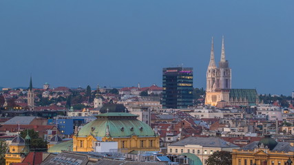 Sticker - Zagreb capitol of Croatia cathedral and modern skyscraper with a old city panorama day to night timelapse