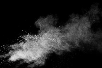 Wall Mural - White powder explosion isolated on black background.White dust particles splash.