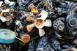 A pile of rusty old car parts at the old car spare parts market