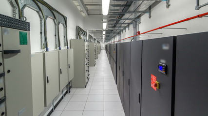 Wall Mural - room with rows of server hardware in data center timelapse