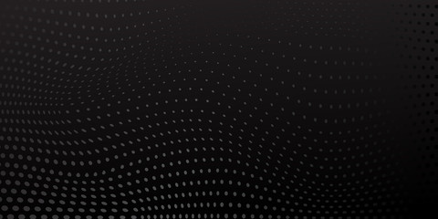 Abstract background made of halftone dots in black and gray colors