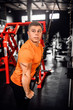 © JonoErasmus - Fit young man doing cable tricep pulldowns during a workout