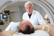 © auremar - male doctor and patient tomographic scanner in hospital