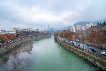 Wall Mural - Beautiful view of Kura river from a bridge in Tbilisi