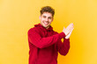 © Asier - feeling energetic and comfortable, rubbing hands confident.