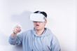 © Steve - People wearing glasses playing vr virtual reality with a handle