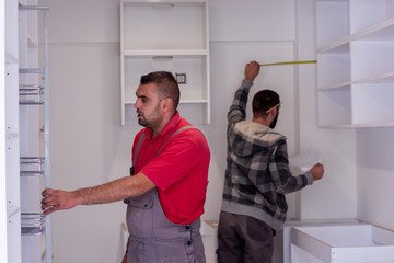 workers installing a new kitchen