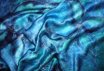 Blue silk fabric with drapery. The texture of the fabric. Natural silk. Blue silk scarf, silk scarf.