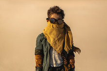 Post-apocalyptic Warrior Boy Outdoors In Desert Wasteland