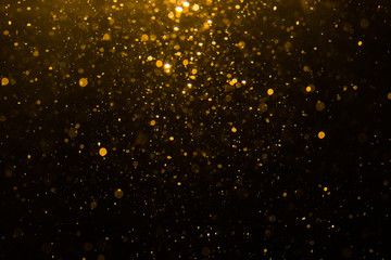 Abstract gold bokeh with black