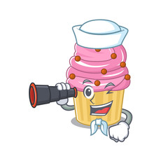 Sticker - A picture of strawberry cupcake working as a Sailor with binocular