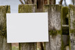 © ABCreative - Old wooden fence with sign and copy space.