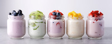 Variety Of Yogurts In Glass Jars. Healthy Breakfast Concept. Banner Photography