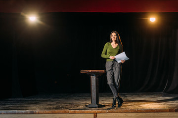 beautiful actress performing role on stage in theatre