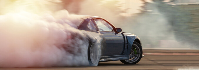 car drifting, blurred image diffusion race drift car with lots of smoke from burning tires on speed 