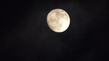 Wall Mural - Time lapse of Big full moon behind moving clouds in 4K 