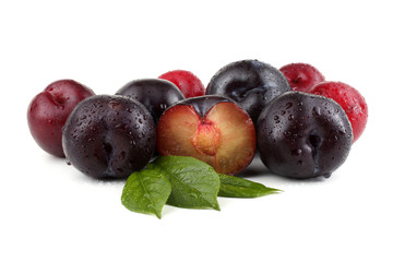 Wall Mural - Plums, plum half and leaves