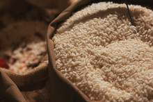 Stock Photo Of A Close-up Of A Sack Full Of Rice At A Market Stall