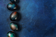 Easter Eggs On Blue Background. Copy Space