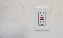 Ground Fault Interrupter Electricity Receptacle And Wall Plate. Residential Gfci Electric Outlet Plug With GFI Reset Button.