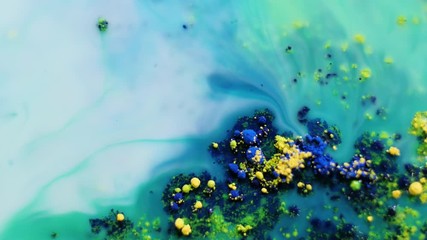 Wall Mural - Multi-colored acrylic paint in motion. Slow motion. Fantastic surface. Abstract colorful paint. Top view