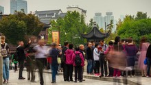day time nanjing city famous old town crowded tourist street temple square timelapse panorama 4k china