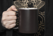 Mock-up Of Black Coffee Mug Girl Woman Holds In Her Hands