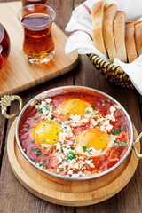 Wall Mural - Shakshuka (menemen) fried eggs in tomato sauce for turkish breakfast.