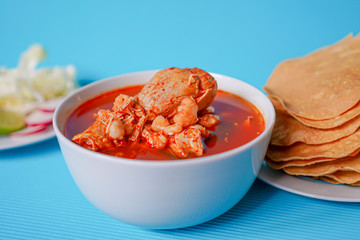 Canvas Print - Delicious typical Mexican red Mexican pozole with tostadas