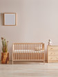 Baby room cradle and crib, bed with frame and lamp concept, pink wall background.
