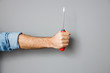Man with screwdriver in hand stock photo