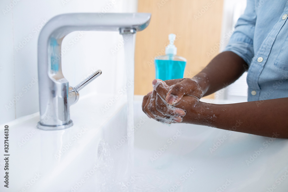 Close Up Of Boy Washing Hands With Soap At Home To Prevent Infection - obrazy, fototapety, plakaty 