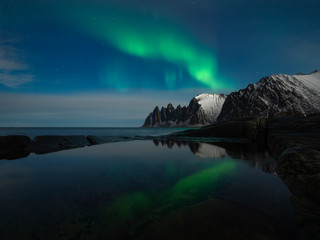 aurora borealis at tungeneset on the island of senja. tungeneset is a well-known place to see the no