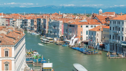 Wall Mural - Top view on central busy canal in Venice timelapse, on both sides masterpieces of Venetian architecture