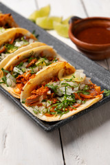 Mexican pork tacos called 