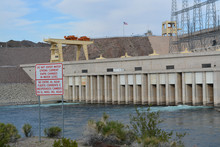 Rapid Changes In Water Level And Do Not Enter The Water Sign Overlooking The Spillway Of The Davis Dam In Laughlin, Clark County, Nevada USA