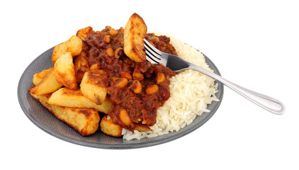 Canvas Print - Chilli con carne meal with half chips and half rice isolated on a white background