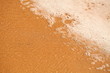 © Elroi - white foam on sandy tropical ocean beach