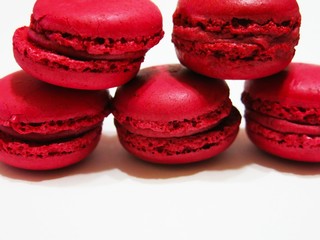 pink macaroons on white background