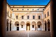 URBINO - ITALY –  Courtyard of Palazzo Ducale (Ducal Palace), now a museum, in Urbino. Marche region, Italy.