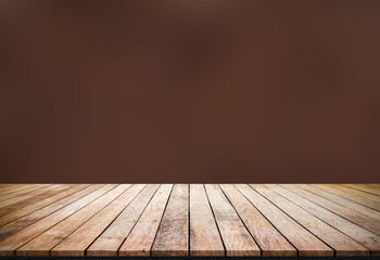 Old wood plank with abstract blurred brown background for product display