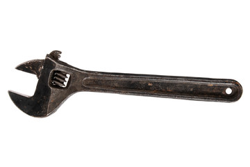 Old tools. Adjustable spanner wrench isolated on white background