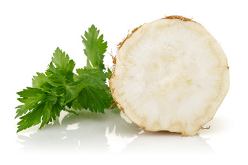 Canvas Print - Fresh half celeriac with leaves isolated on white