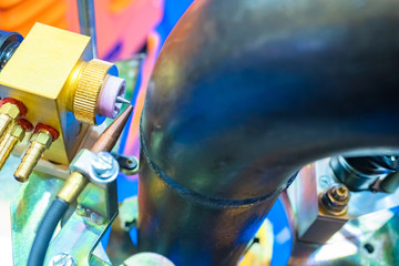 Poster - Metalworking. Metalworking machine. Equipment for cutting holes in pipes. Machine for punching holes in metal pipes. A special device for punching holes in a metal pipe.