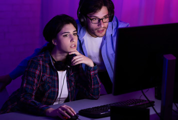 Aufkleber - Millennial Couple Playing Computer Games Sitting Together At Home