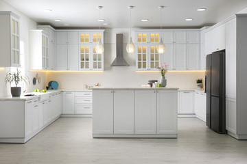 Sticker - Modern kitchen interior with stylish white furniture