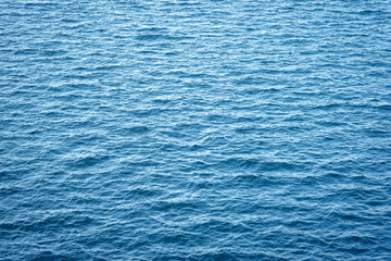 Blue Sea surface with waves