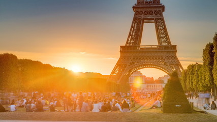 eiffel tower seen from champ de mars at sunset timelapse, paris, france